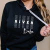 river babe in white on black hoodie
